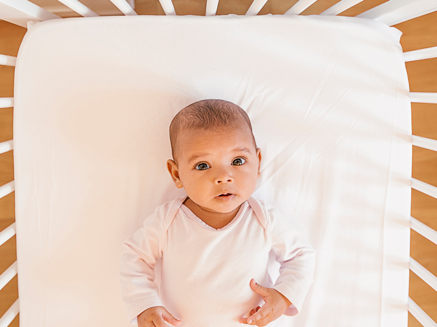 babies sleeping in cribs